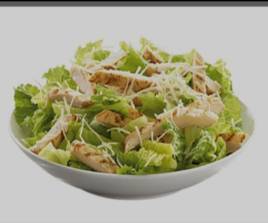 Caesar salad with fresh chicken pieces